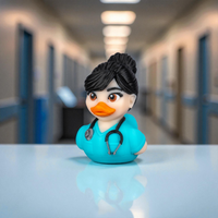 Figurine of a duck dressed as a doctor in a hospital setting