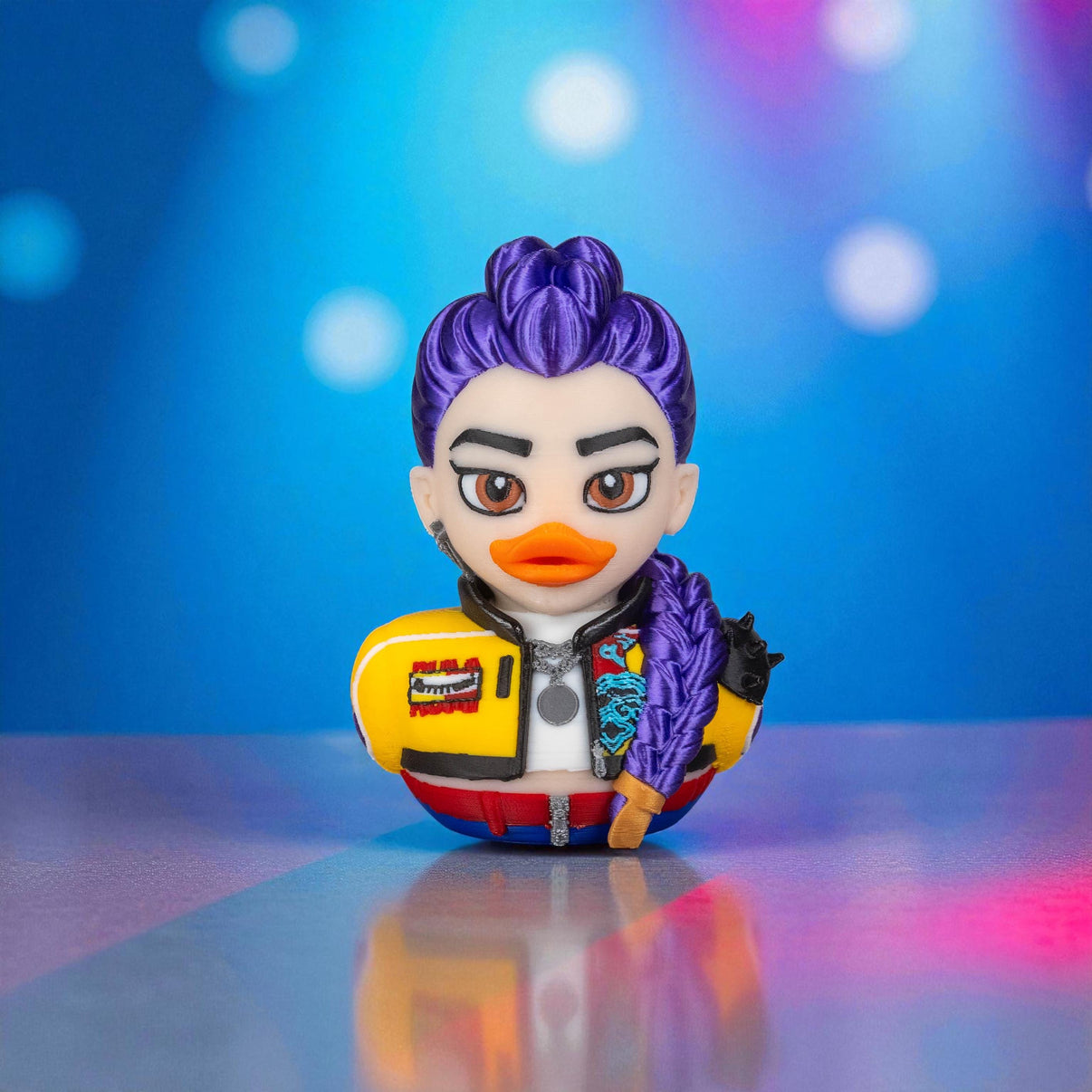 Colorful figurine with purple hair and a yellow jacket on a reflective surface with a blurred colorful background
